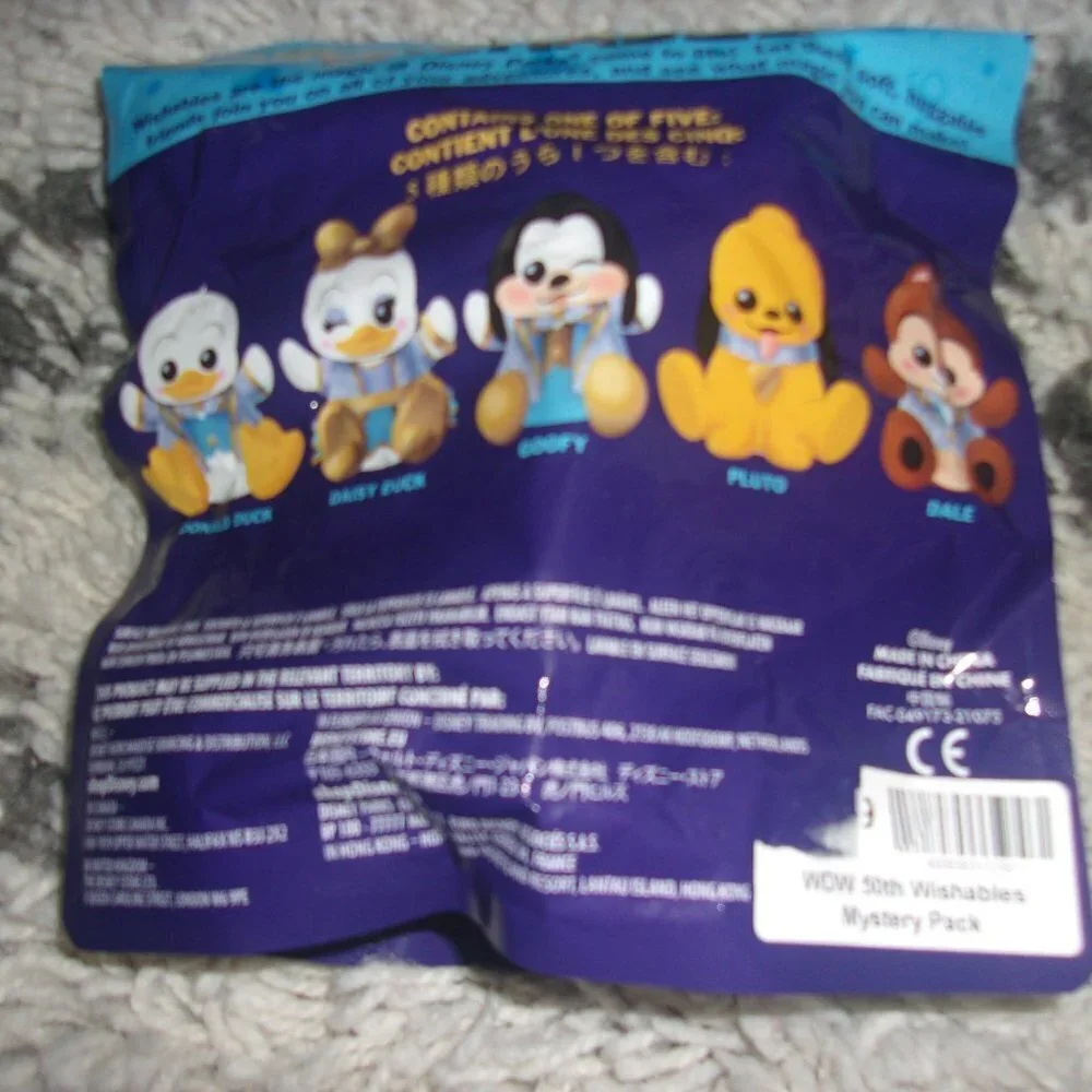 New in package Mystery Disney Wishables 50th Anniversary series